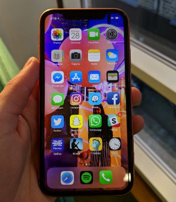 iphone xr in hand small